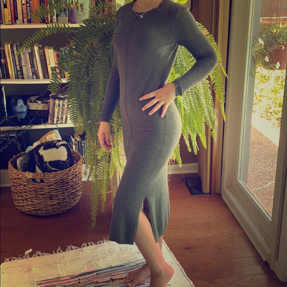 Body con sweater dress with side slits.